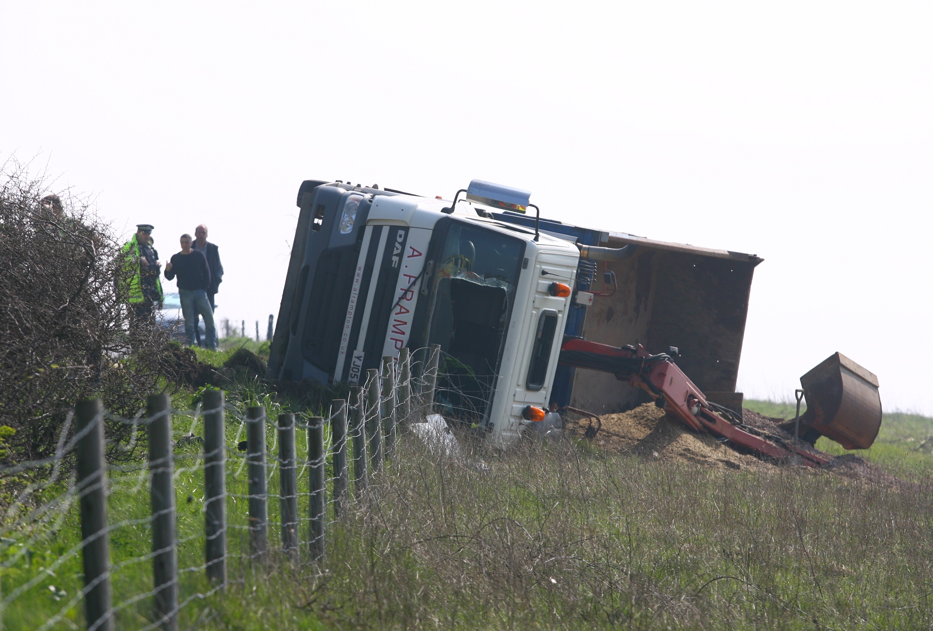 LORRY AND CAR COLLIDE ON THE DOWNS