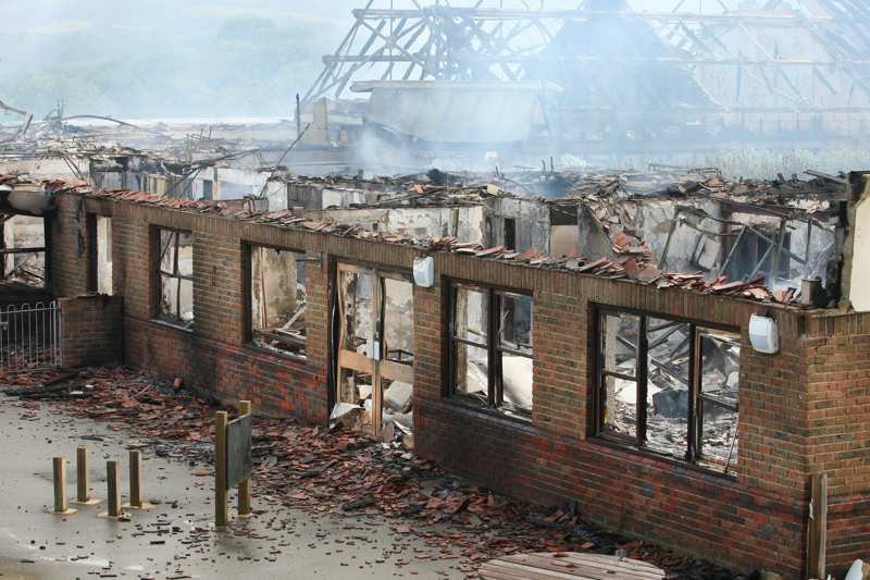 DAYLIGHT REVEALS DESTRUCTION TO LAKE SCHOOL