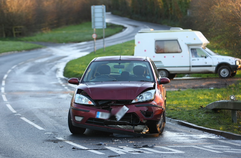 CARS COLLIDE IN ICY CONDITIONS