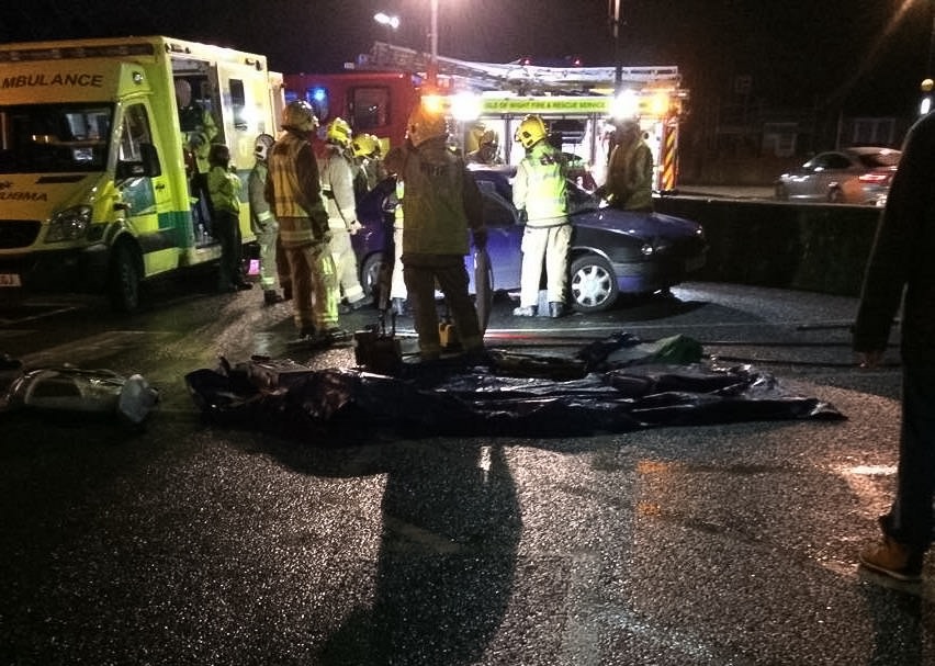 CAR ROOF CUT OFF FOLLOWING CRASH IN LAKE 