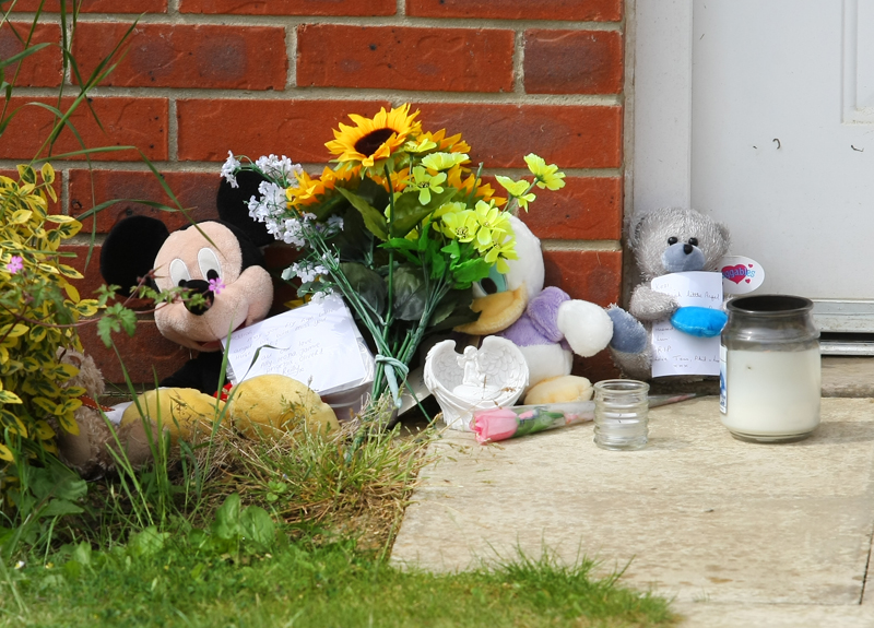 TEDDIES AND FLOWERS LEFT AT SCENE OF EAST COWES DEATHS