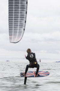 Cowes. Isle of Wight. UK. 30th June 2016. The Bridge family raced around the Isle of Wight on hydrofoil kiteboards in world record times (subject to ratification by the WSSR) Guy Bridge (16) was the first to finish, with a time of 2 hours, 32 minutes and 25 seconds. Older brother Olly Bridge(18) finished 2nd with a time of 2 hours, 32 minutes and 27 seconds. Their mother Steph Bridge (five times World Kite Race Champion) finished in 3 hours, 3 minutes and 24 seconds and claimed the female record. Credit : Lloyd Images