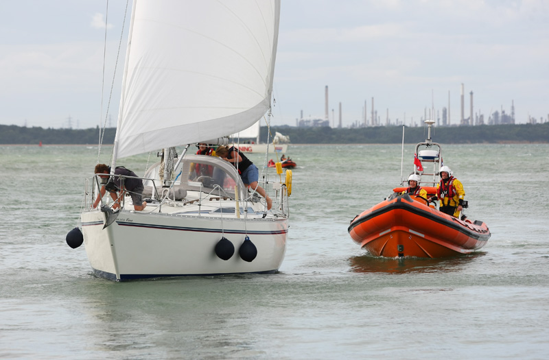 LIFEBOATS RUSH TO BOAT ‘ON FIRE’