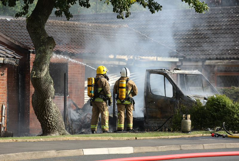 CAMPERVAN BLAZE SPREADS TO BUNGALOW AND GARAGE