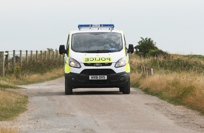 PERSON ON CLIFF EDGE PROMPTS EMERGENCY RESPONSE
