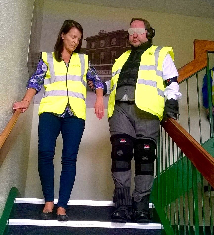 BUS DRIVERS DON SIMULATION SUITS TO AID UNDERSTANDING