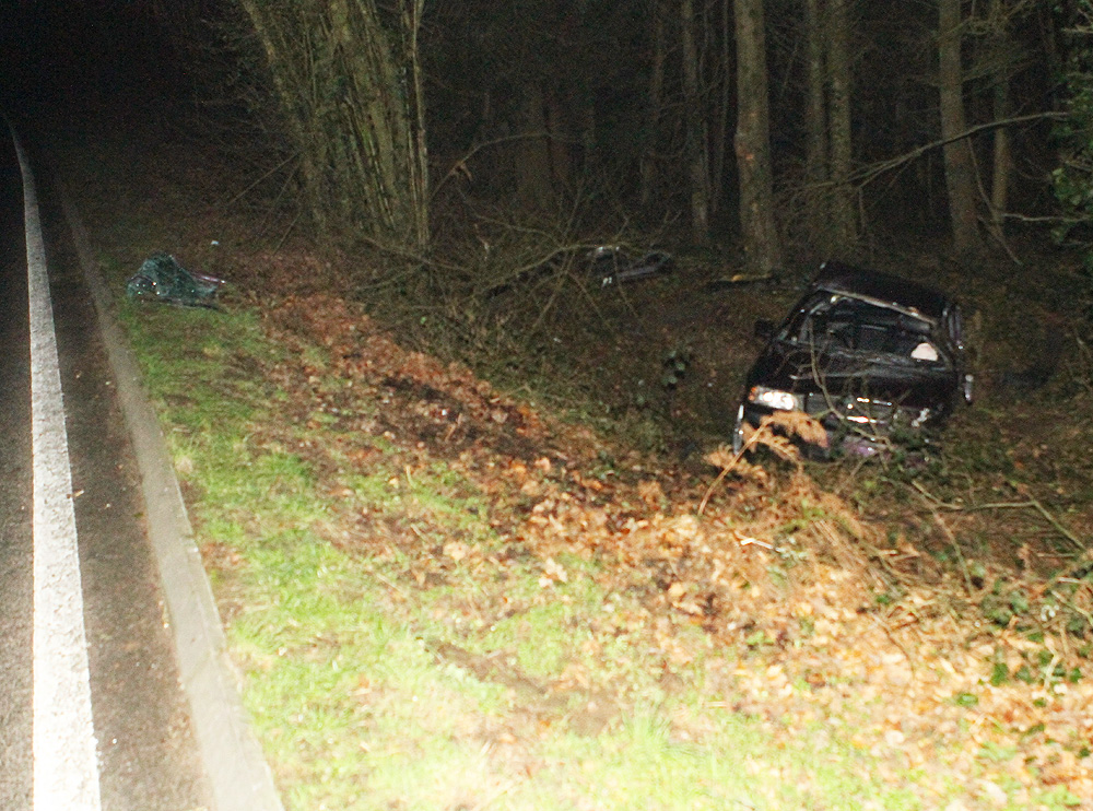 CAR LEAVES THE ROAD ON BEAPER SHUTE