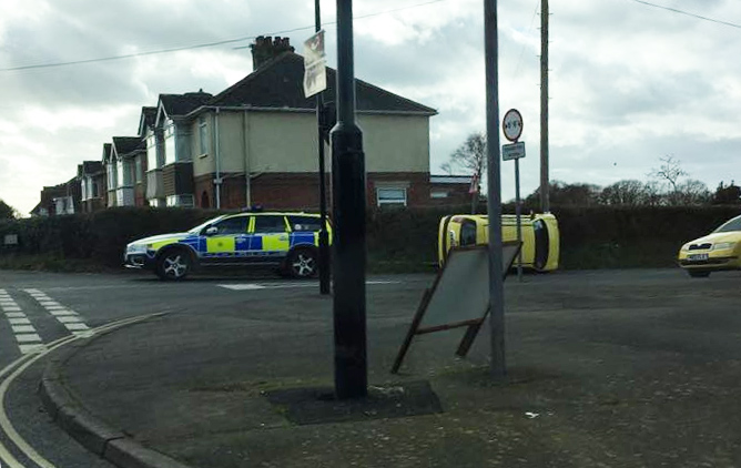 CAR ON ITS SIDE NEAR GURNARD