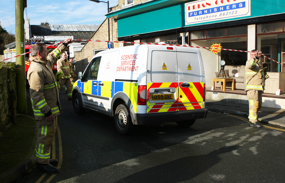POLICE INVESTIGATORS PROBE SHANKLIN FIRE
