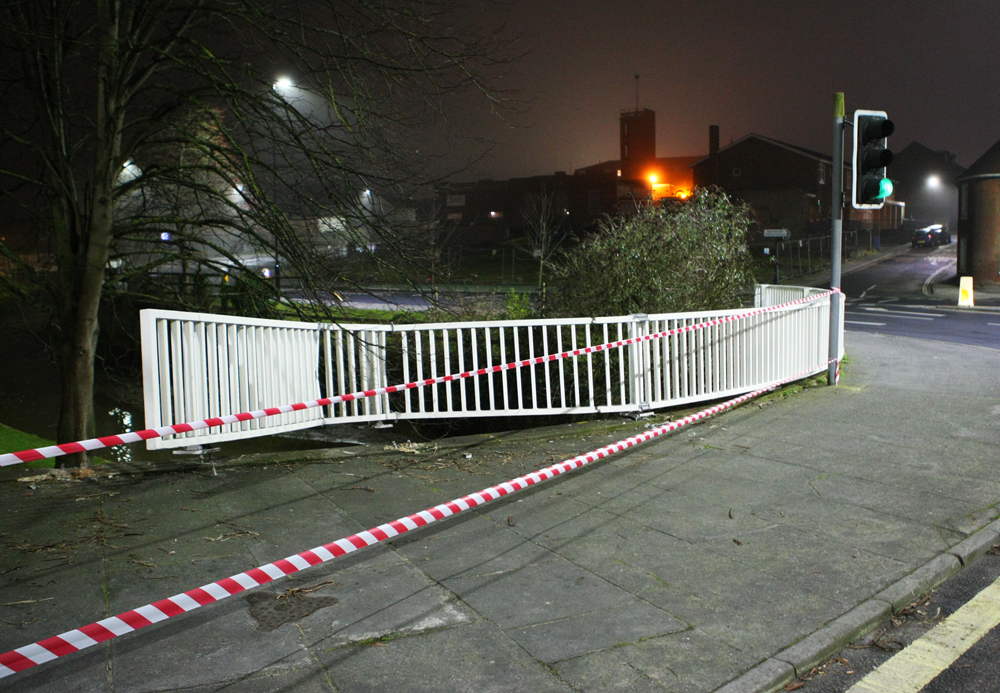WOMAN ESCAPES DEATH AFTER CAR PLOUGHS INTO RIVER