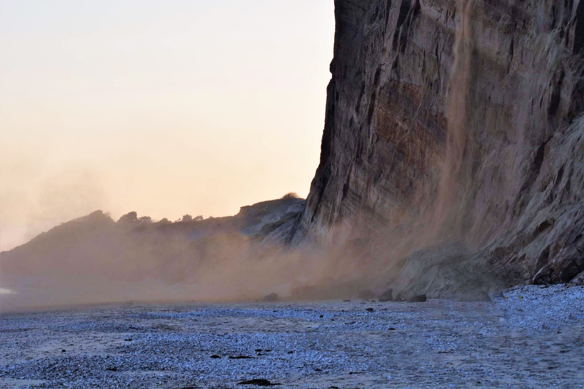 CAUTION URGED AS CLIFF STARTS TO FALL AT YAVERLAND