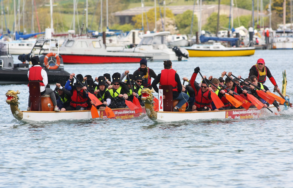 DRAGON BOATS BATTLE IT OUT ON THE RIVER MEDINA