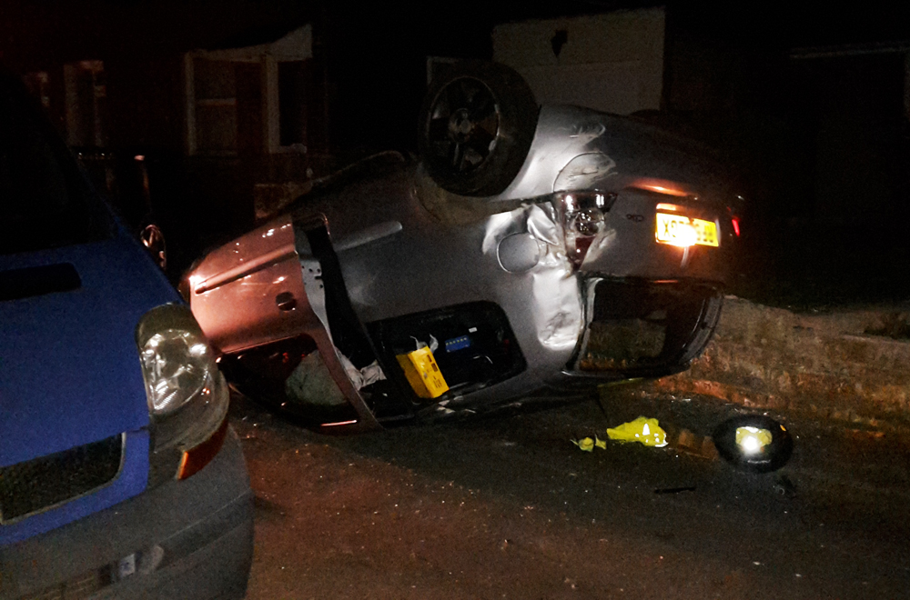 CAR ON ROOF IN NEWPORT CRASH