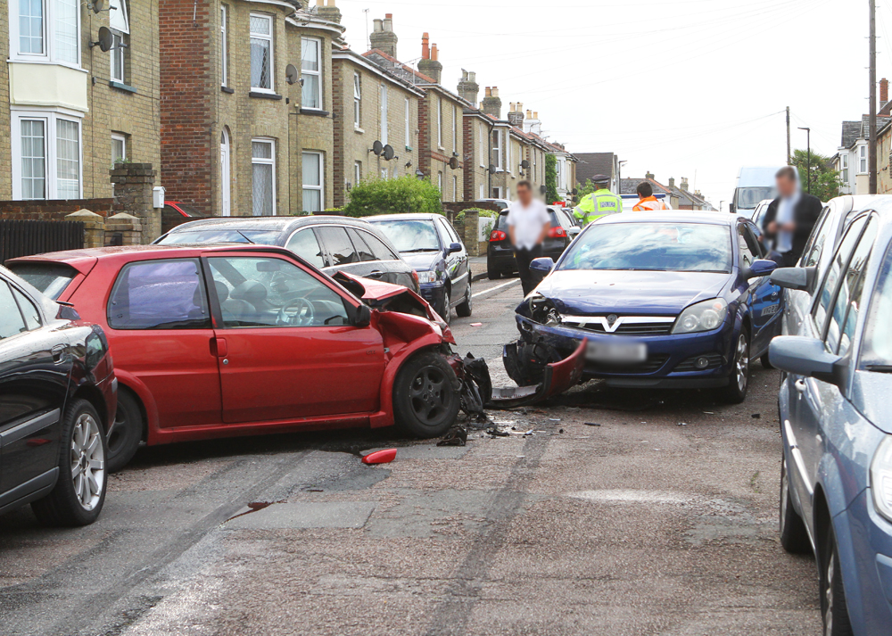 DRIVERS ESCAPE INJURY IN 2-CAR SMASH