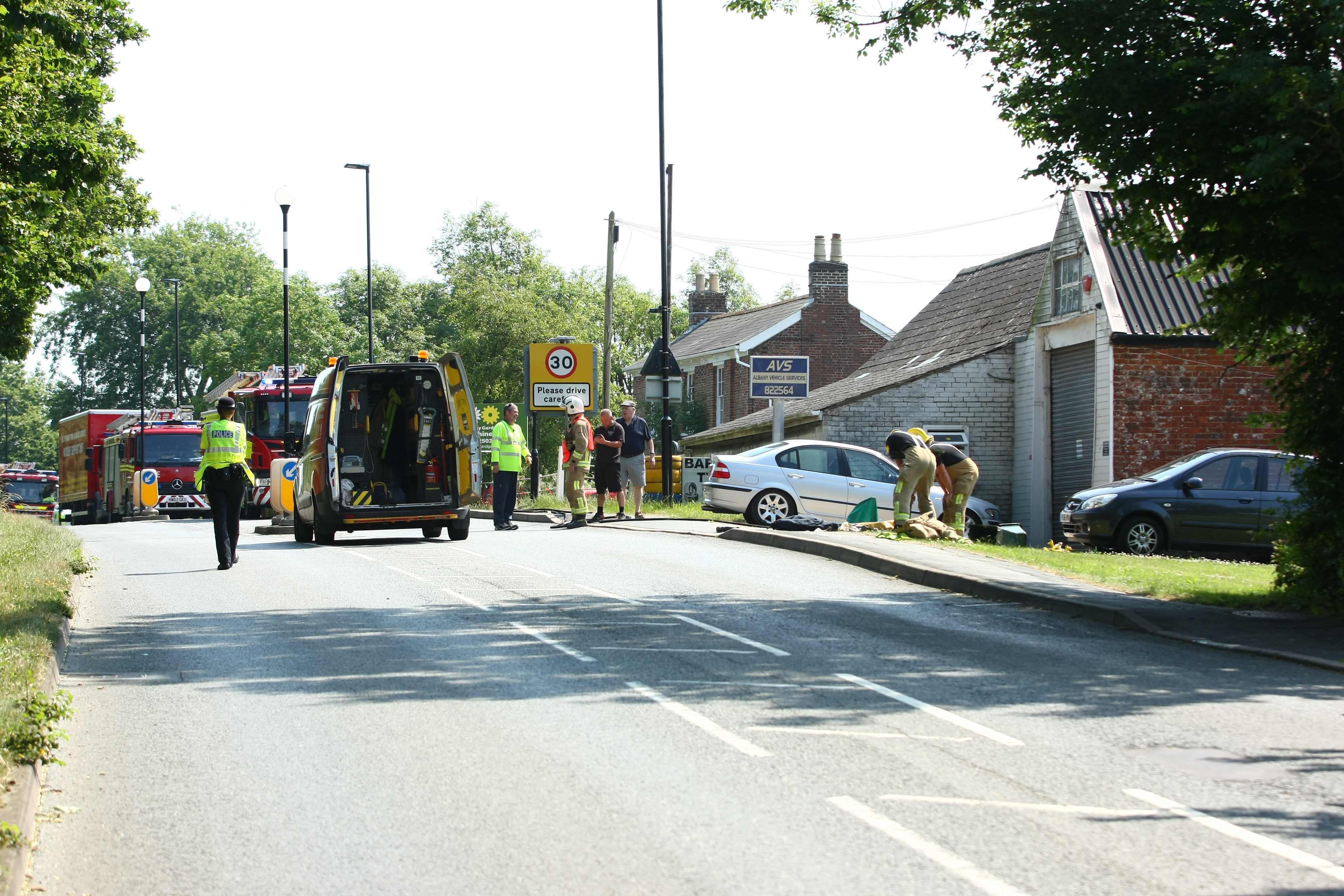 ROAD CLOSURE AFTER CAR HITS GAS MAIN