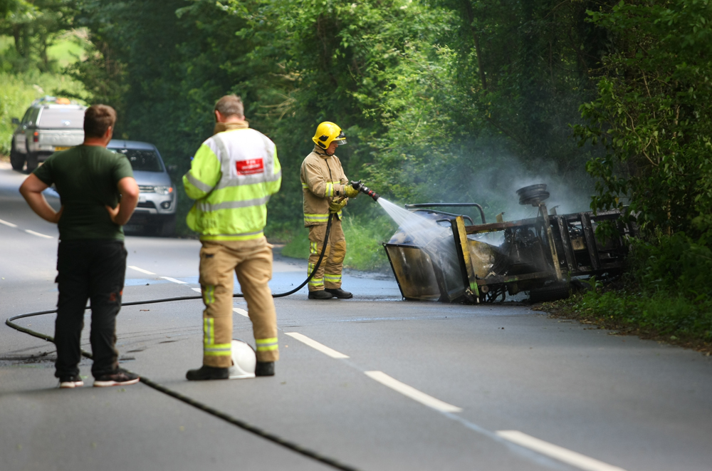 WOOD CHIPPER BLAZE CLOSES ROAD