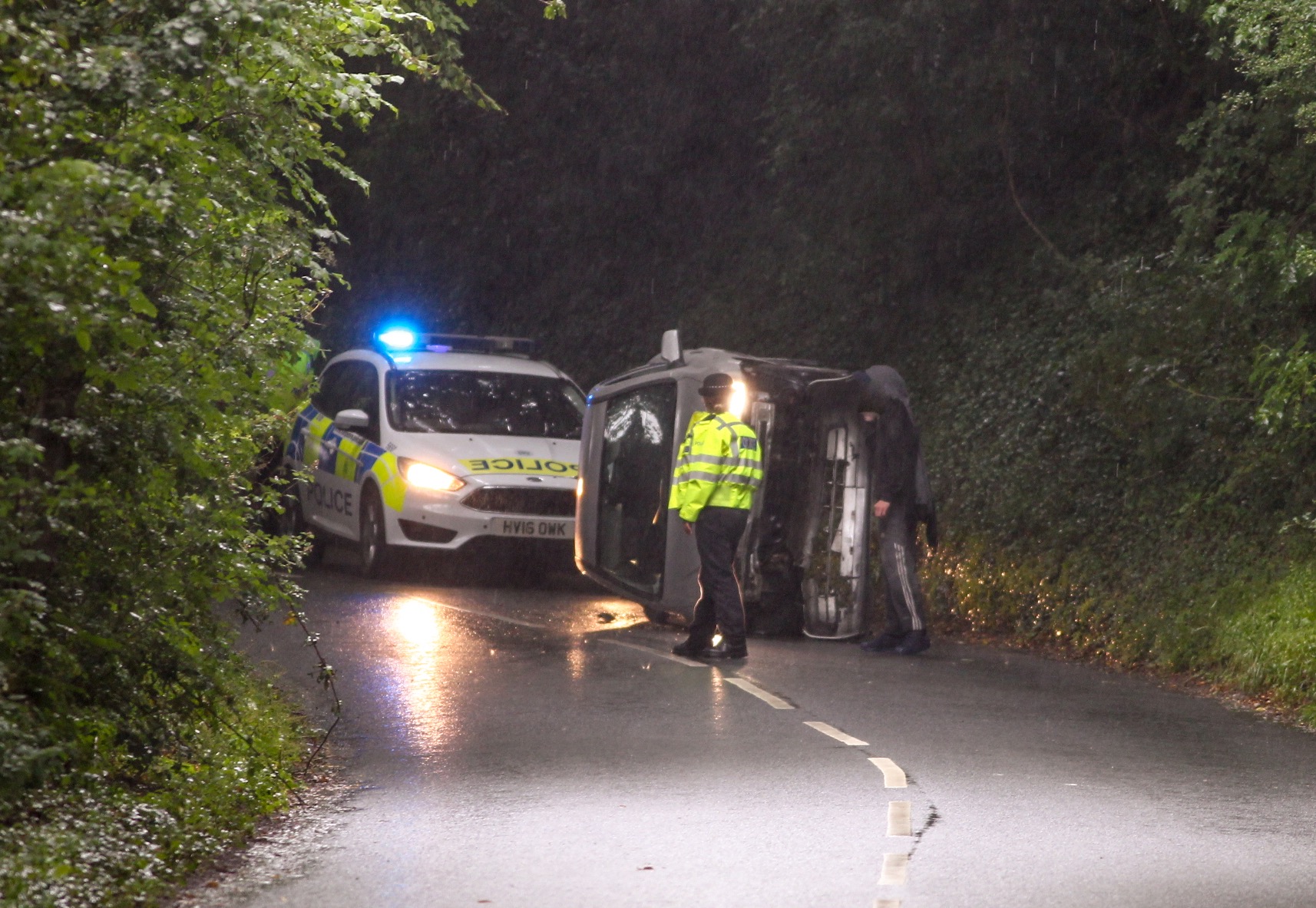 CAR ROLLS ONTO ITS SIDE AT KNIGHTON