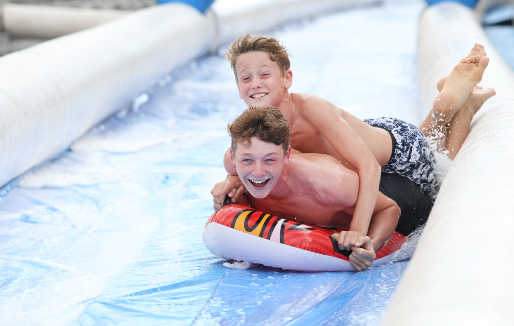 TRIUMPHANT DAY FOR SELL-OUT RYDE SLIDE FUNDRAISER