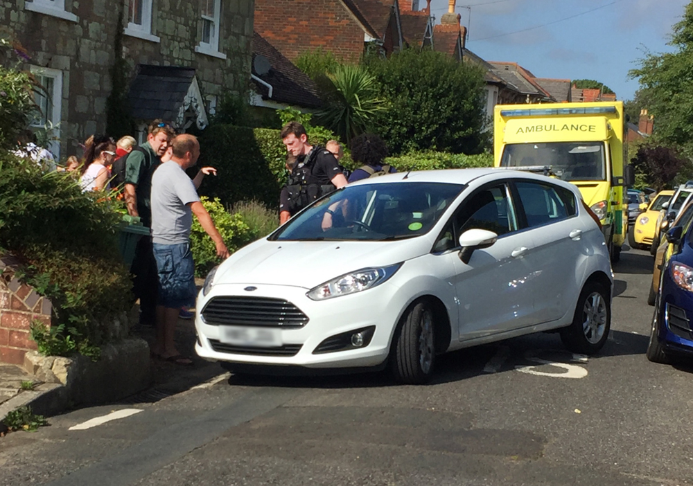 CAR CRASHES INTO WALL IN CARISBROOKE