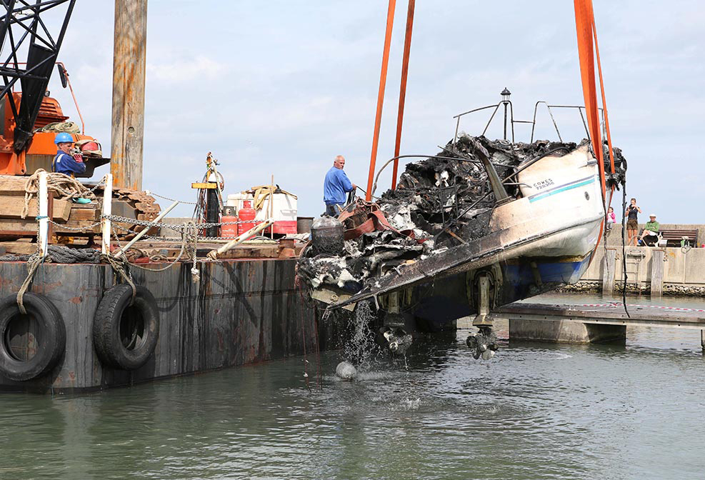 SUNKEN BOAT RECOVERED FROM RYDE HARBOUR