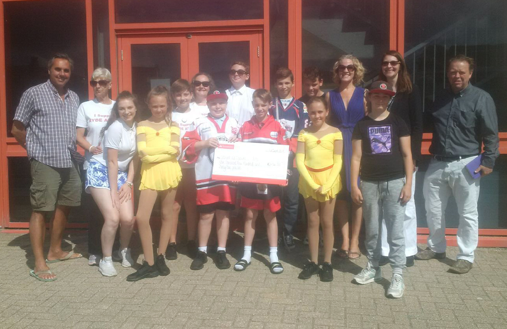 RYDE SLIDERS AND SKATERS PRESENT CHEQUE FOR OVER £1,400