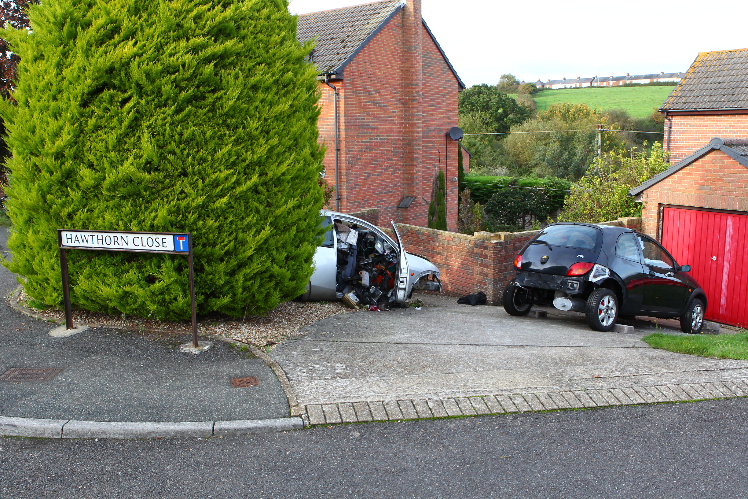 MAN TRAPPED UNDER CAR IN NEWPORT