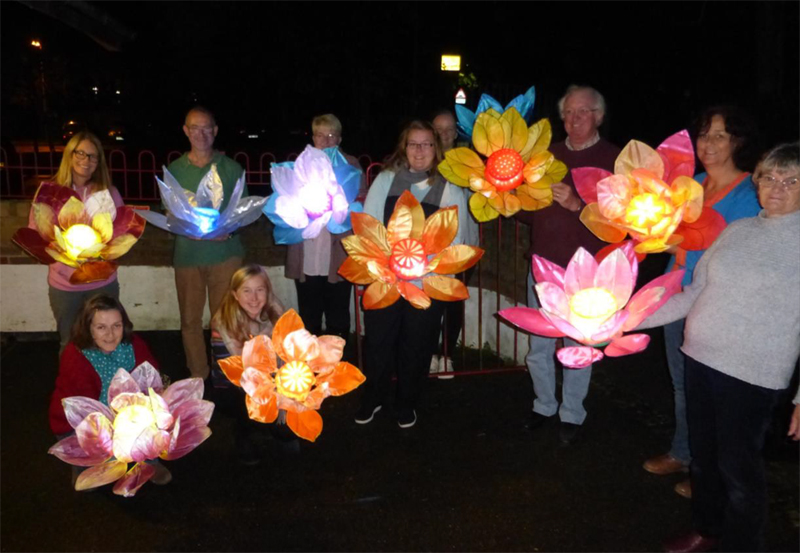 COMMUNITY GROUPS LIGHT UP DARK NIGHTS AT THE GARLIC FARM