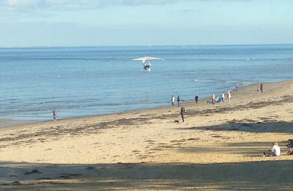 LOW FLYING MICROLIGHT CAUSES CONCERN AT RYDE BEACH