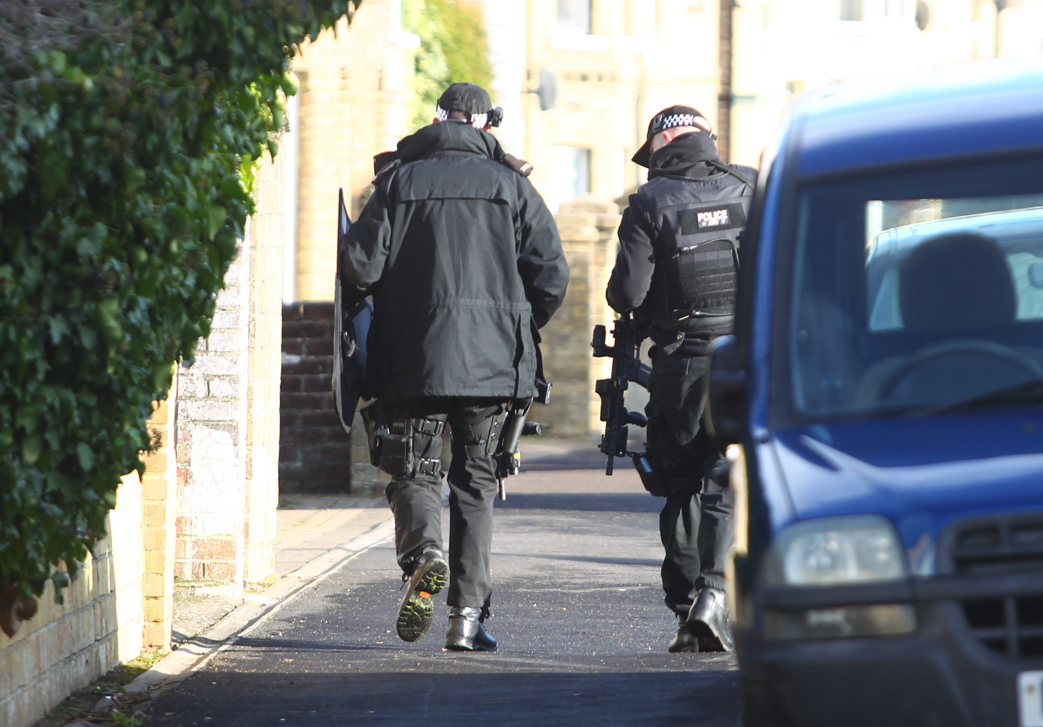 ARMED POLICE DESCEND ON RYDE STREET