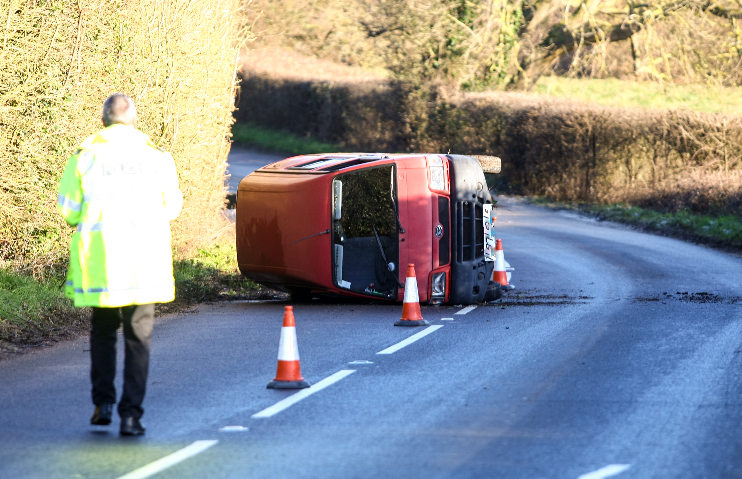 VAN OVERTURNS NEAR ST HELENS