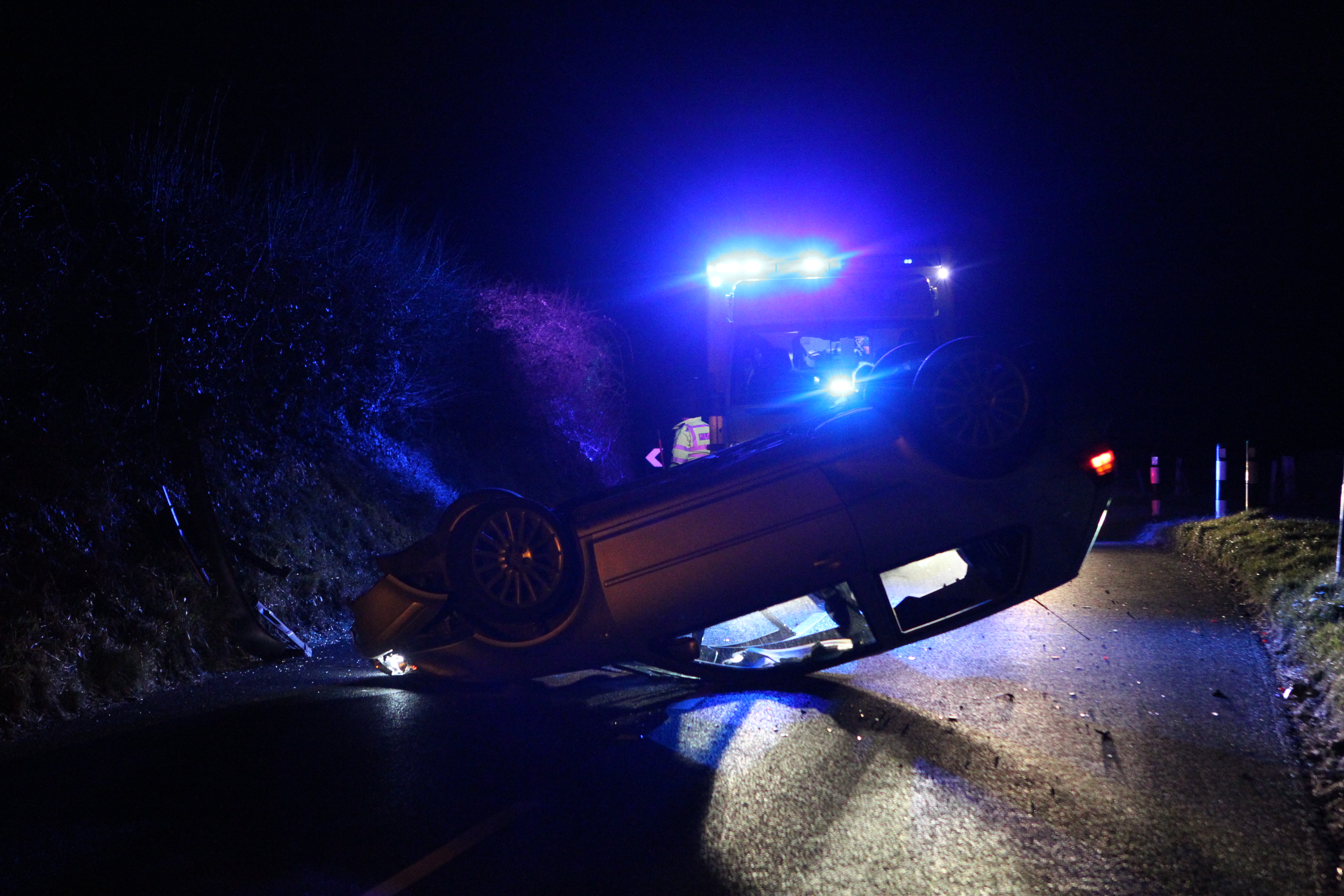 CAR ON ROOF BLOCKS BRADING DOWNS ROAD