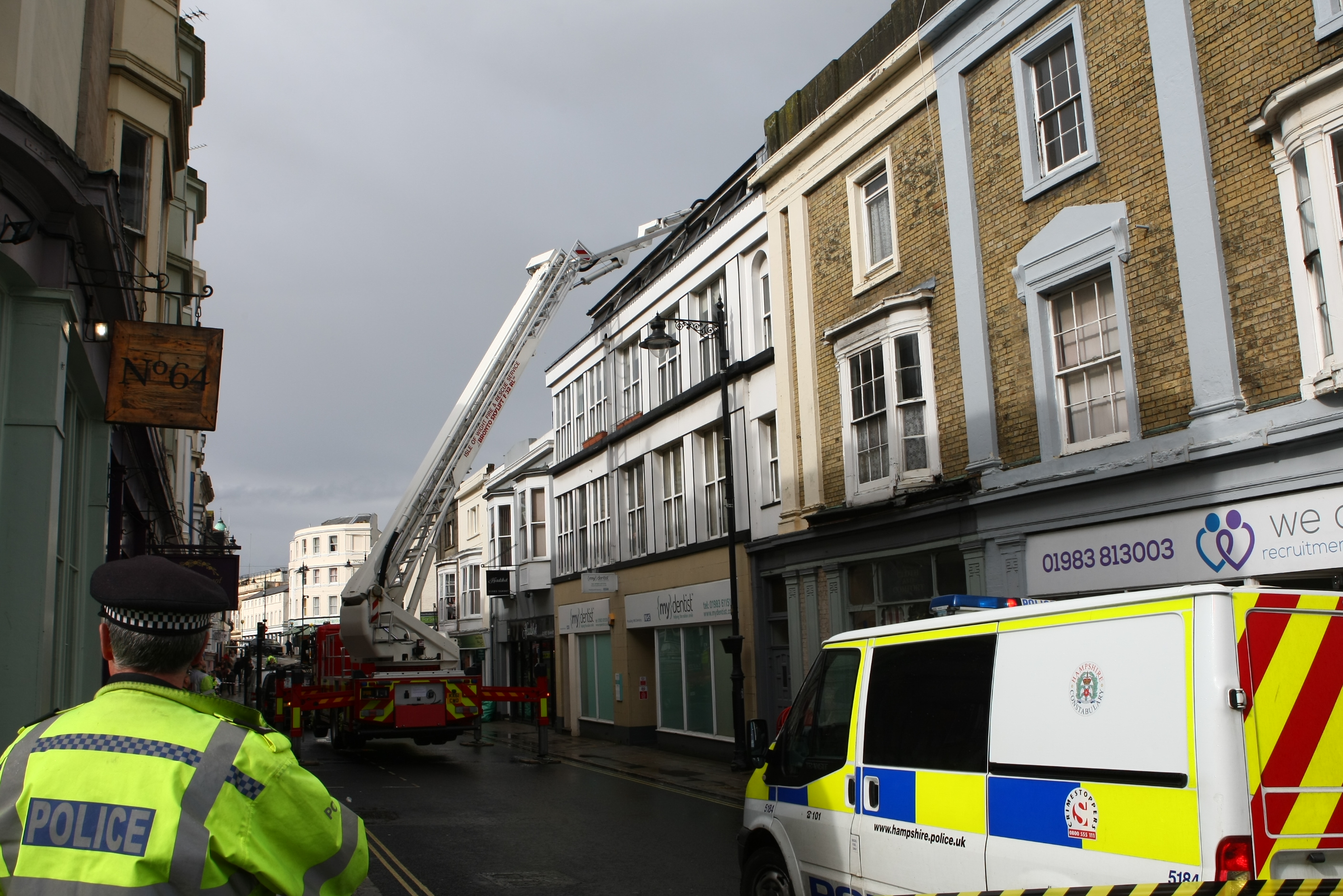 MAN ON ROOF CLOSES BUSY RYDE ROAD