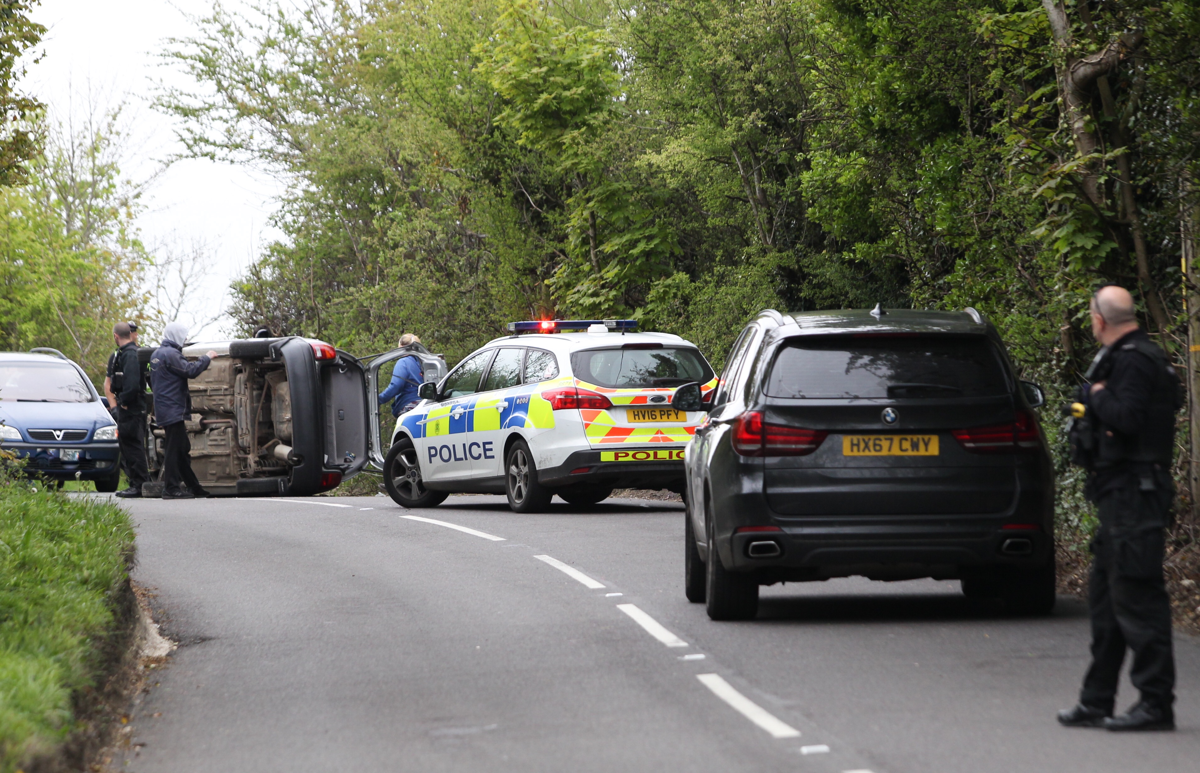 CAR FLIPS AFTER HITTING BANK ON BRADING DOWNS