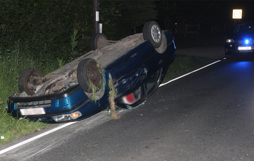CAR ROLLS ONTO ROOF NEAR BRADING