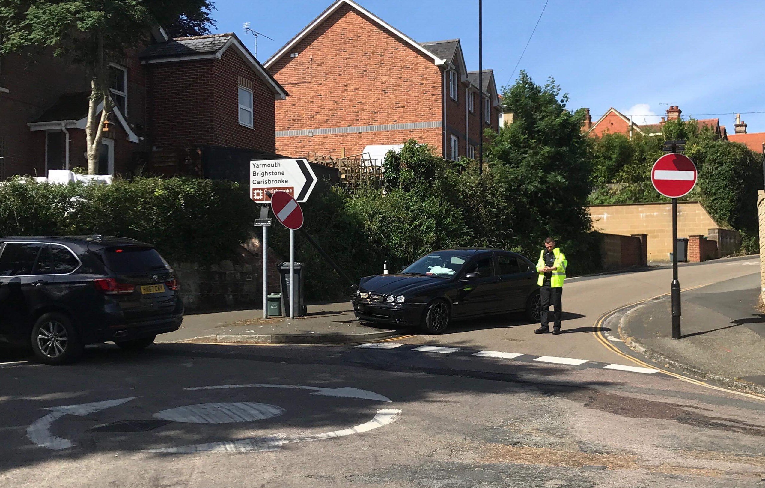 JAG CRASHES INTO SIGN POST IN NEWPORT