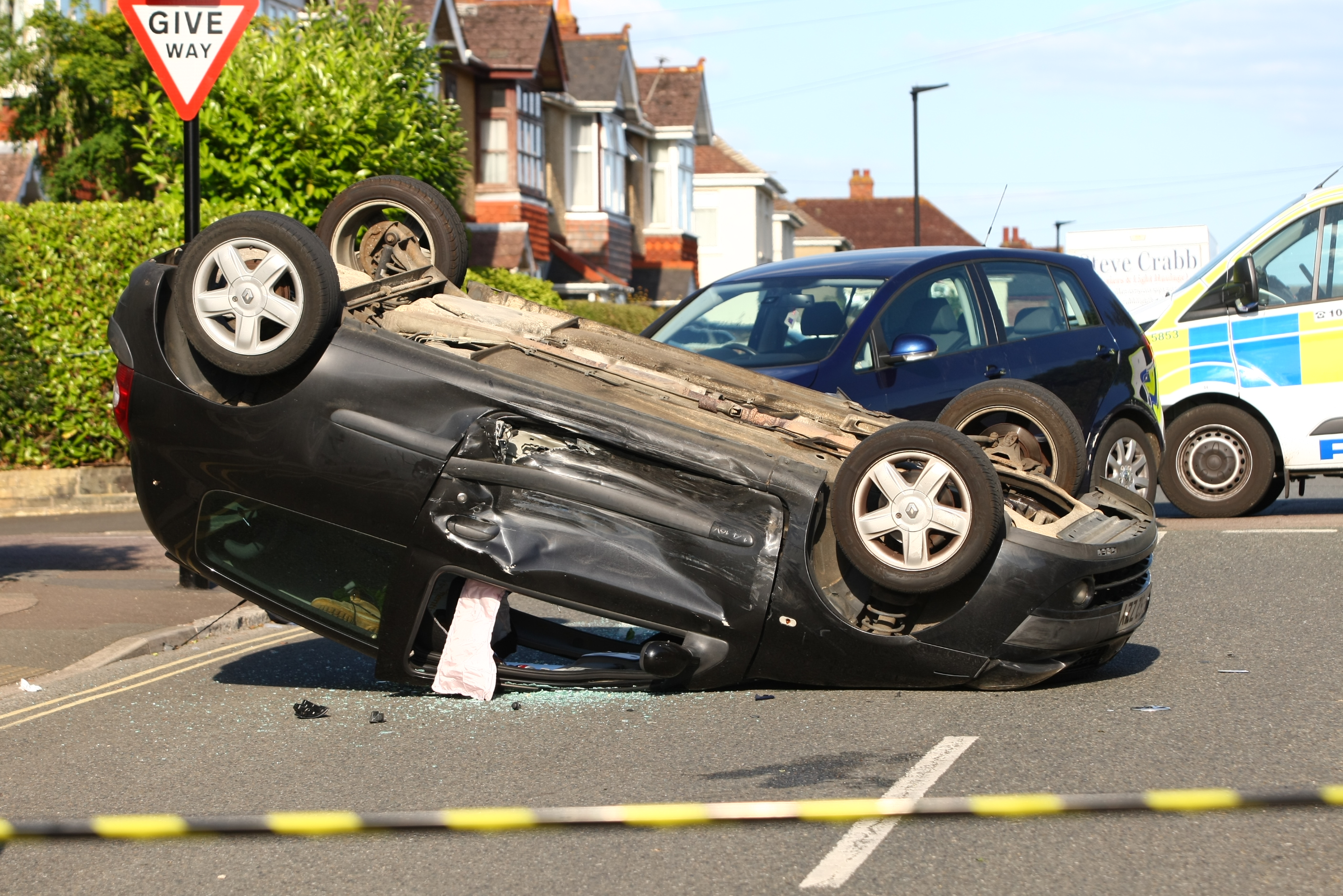 CLIO ON ROOF AFTER 2-CAR CRASH IN RYDE