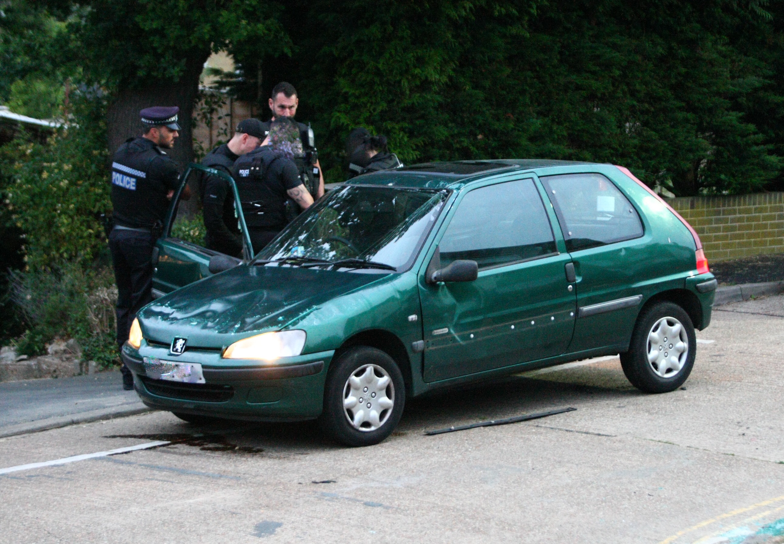 POLICE SEARCH AFTER CAR ROLLS ON BINSTEAD ESTATE