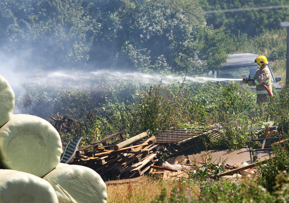 FIRE IN THE OPEN AT BORTHWOOD FARM