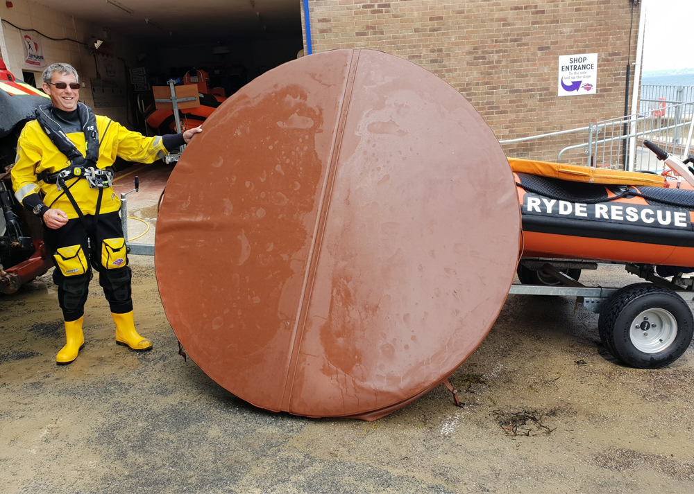 HOT TUB COVER FLOATING OFF RYDE PROMPTS LIFEBOAT LAUNCH