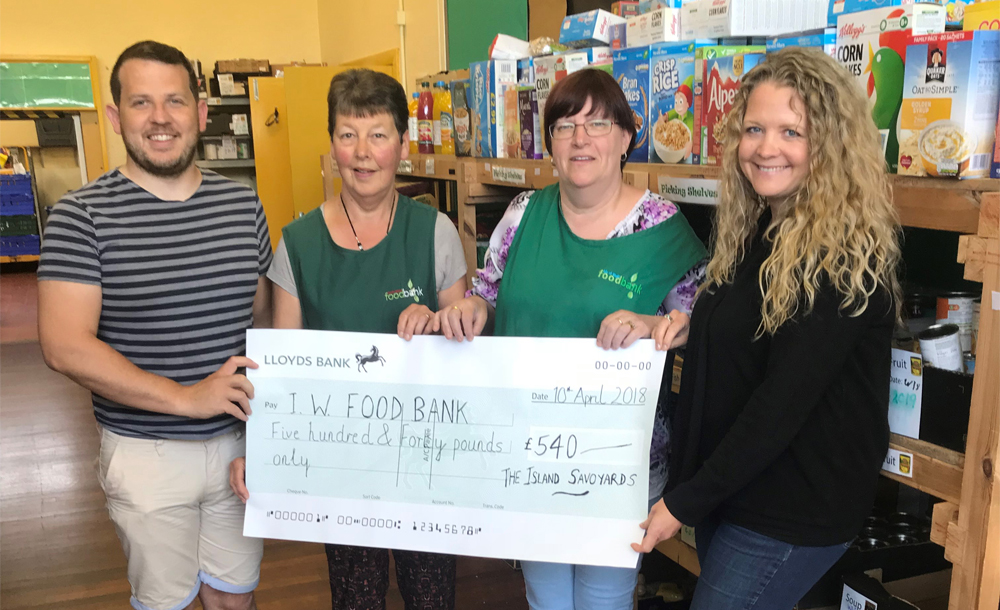 ISLAND SAVOYARDS DONATE £540 TO THE ISLE OF WIGHT FOODBANK