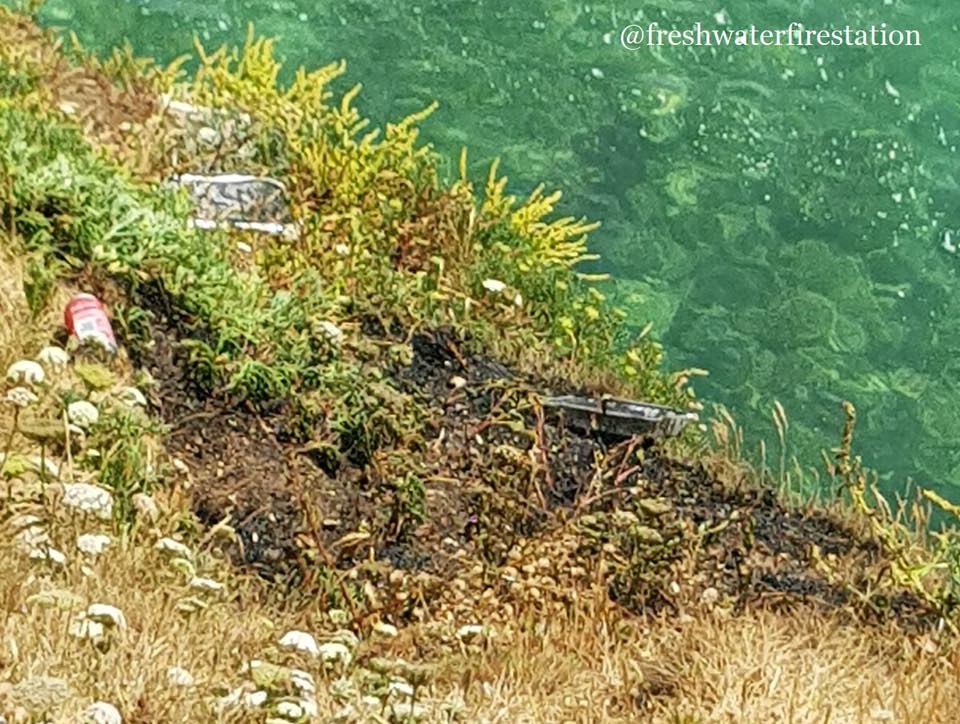 POORLY DISCARDED BBQ LEADS TO CLIFF SIDE FIRE