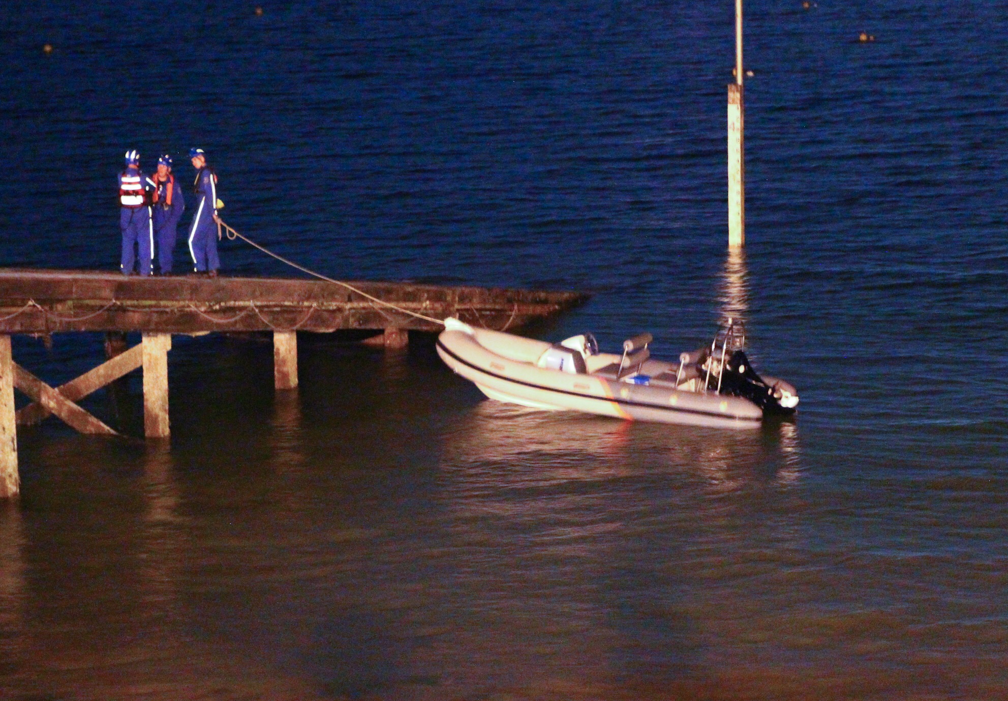 3 MEN AND A BOAT BROUGHT ASHORE AT SEAVIEW
