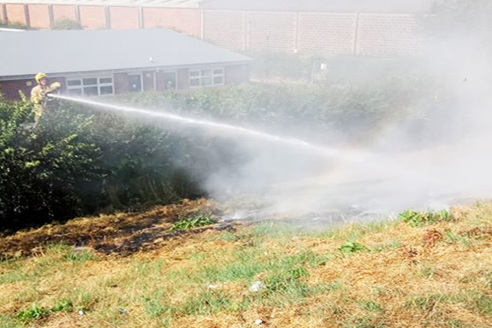 FIREFIGHTERS TACKLE DELIBERATE FIRE AT NINE ACRES