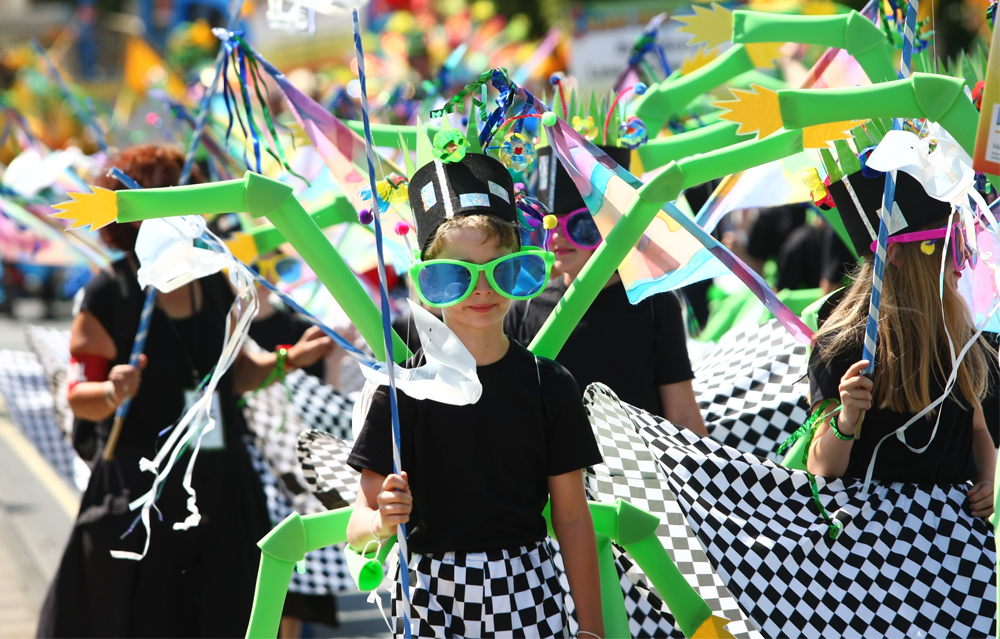 CARIBBEAN-LIKE SUNSHINE SHINES DOWN ON ANNUAL MARDI GRAS PARADE