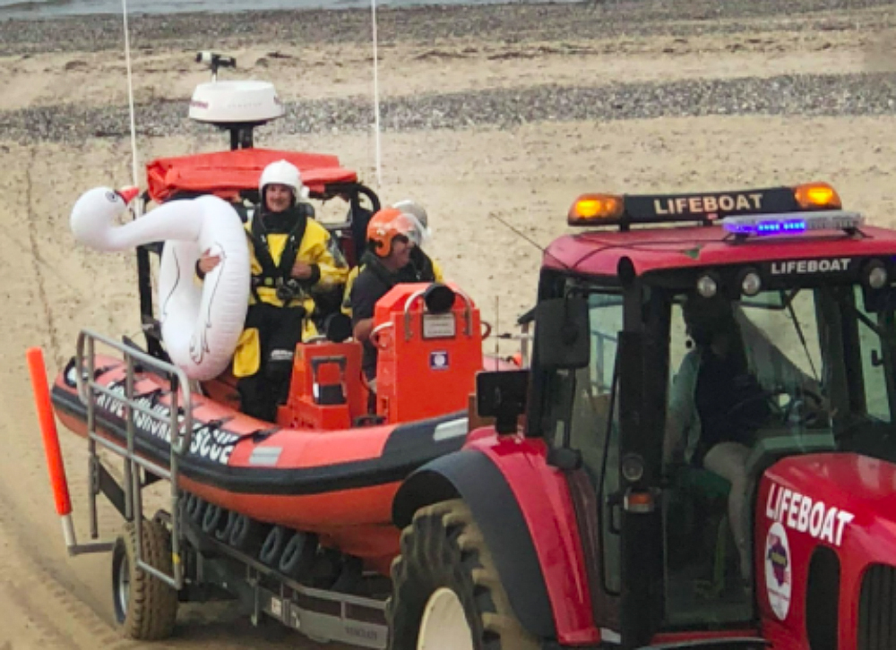 INFLATABLE SWAN RECOVERED A MILE OUT TO SEA