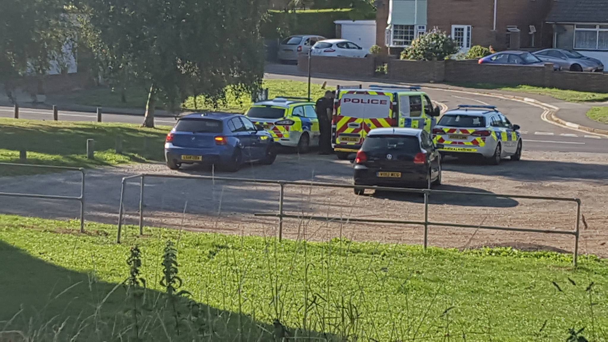 POLICE DESCEND ON LAKE IN CONTINUED SEARCH FOR WANTED MALE