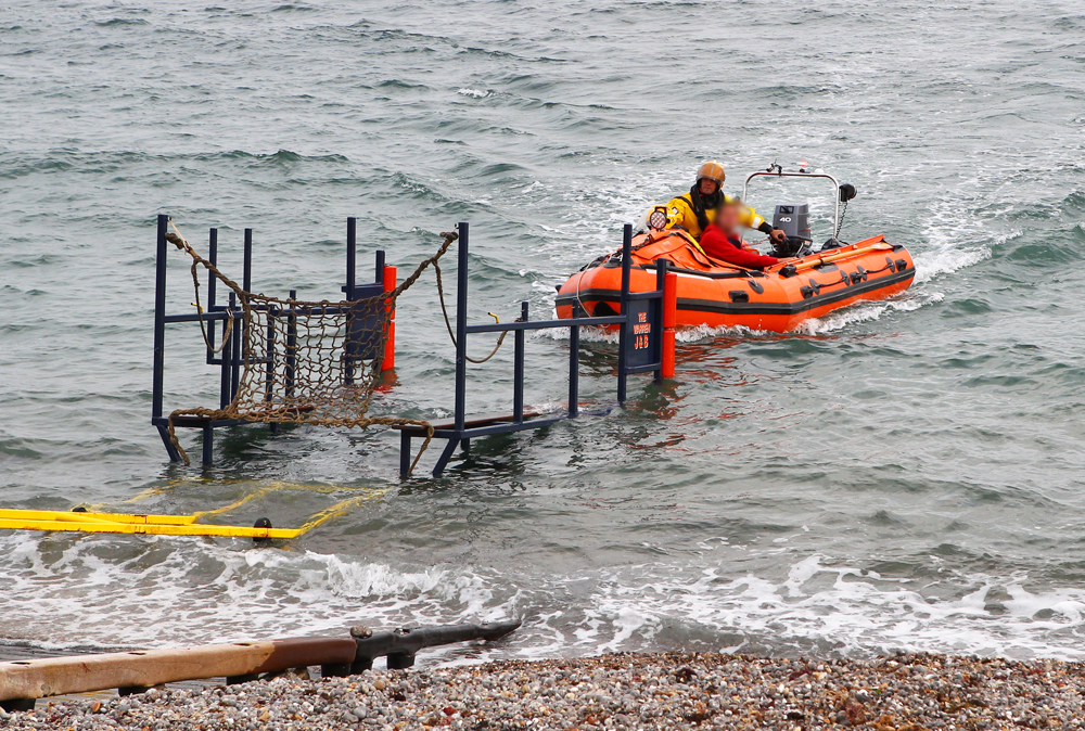 KAYAKER RESCUED FROM THE ROCKS AT FRESHWATER