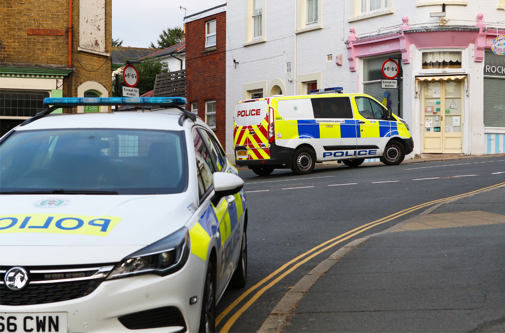 MAN ON ROOF FORCES POLICE TO CLOSE SHANKLIN ROAD
