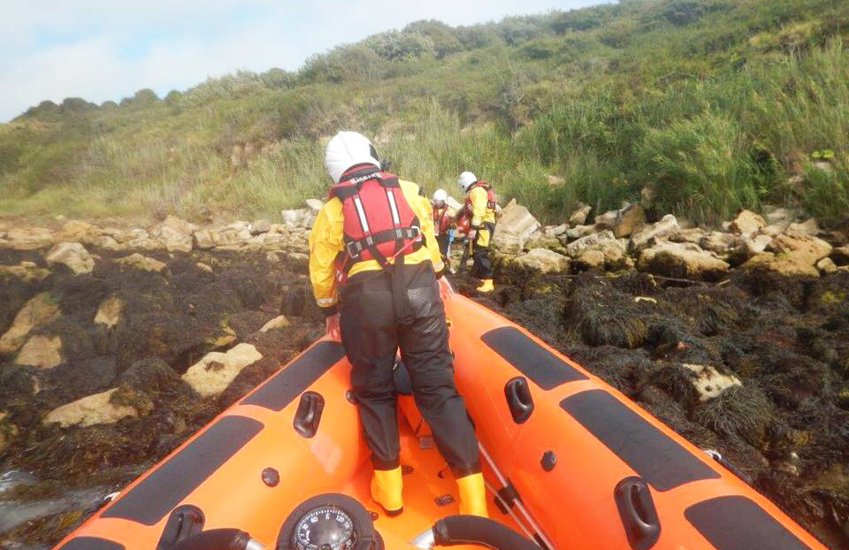 MUM AND 2 KIDS RESCUED AFTER GETTING CUT OFF BY THE TIDE