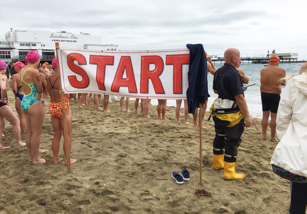 LIVELY SEAS MAKE FOR A TOUGH PIER TO PIER SWIM